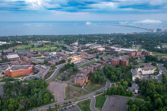 Aerial view of the U of M Duluth campus with Lake Superior in the background