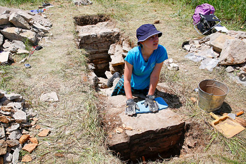 A student works on a dig at Fort Snelling.
