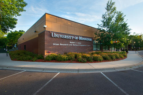 An exterior view at sunset of the Robert J. Jones Urban Research and Outreach-Engagement Center