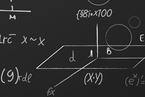 Math equations on a blackboard.