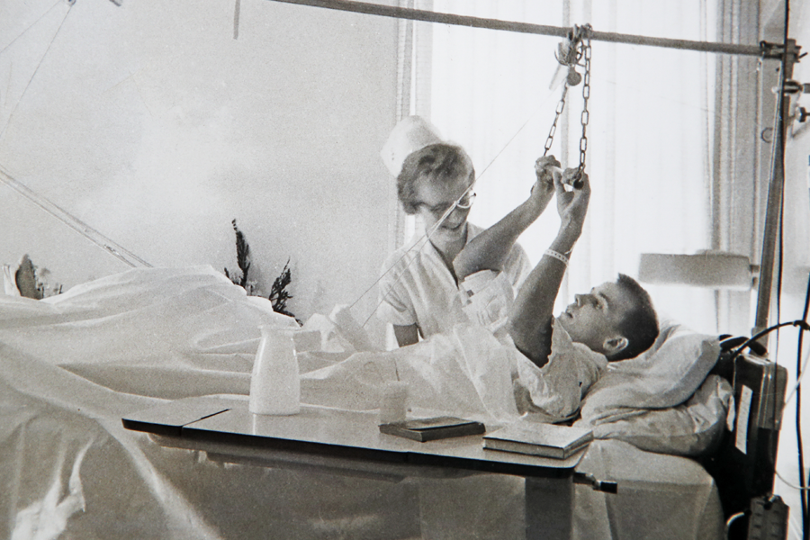 Betty Sandison attends to a patient in 1958.