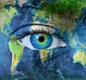 an eye on a world map graphic