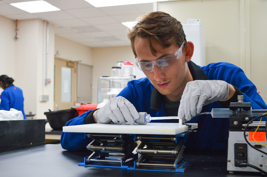 Student working in a science lab