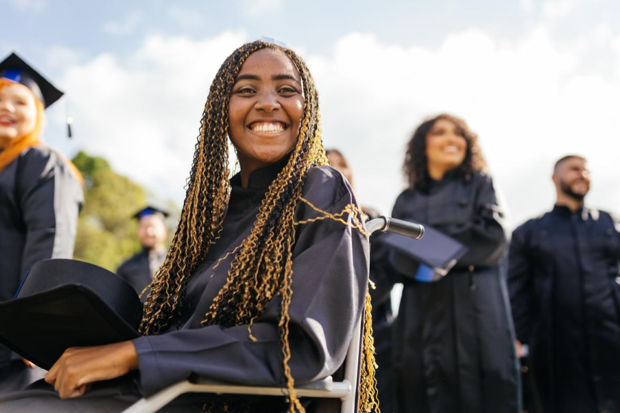Young Black woman in a graduation gown