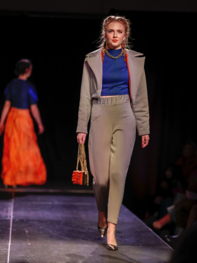 Models walks the runway in one of Kai Johnson's designs