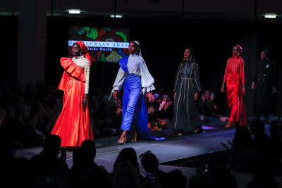 Models wear Moosa's designs during show