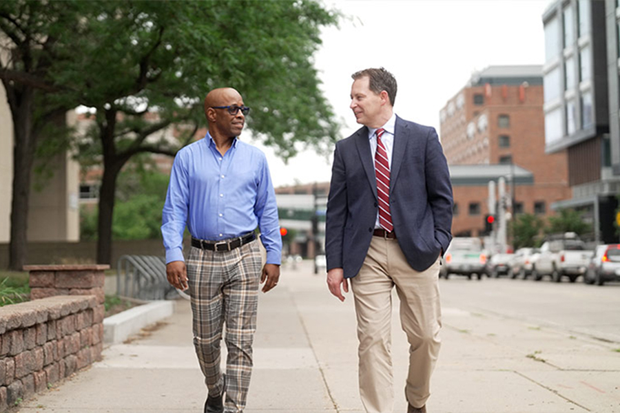 George Surratt walking with Dr. Andrew Adams