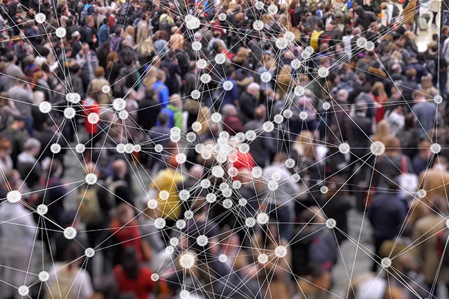 crowded street seen from high up, with illustration overlaid of grid shapes indicating potential virus spread