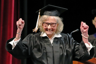 Betty Sandison reacts as her name is read during commencement.