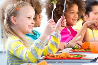 Image of students eating lunch at the cafeteria. 