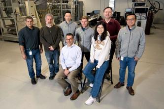 UMN startup Niron Magnetics staff members at their Minneapolis pilot plant: COO John Larson (seated), and U of M alumni employees of the company: Fan Zhang Ren. Back row: Sam Rahmani, Rich Greger, Xiaowei Zhang, Dustin Sprouse, Robert Brown, and Yiming Wu. Credit: Rob Levine