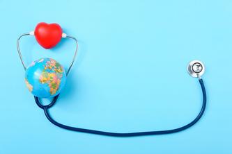 Image of a stethoscope with a global and heart attached.