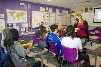 Heather Dodds instructs high school students in a classroom