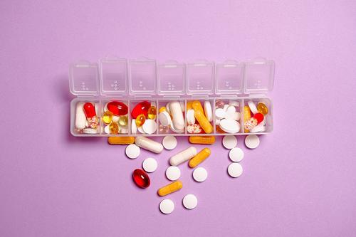 Stock image of medicine case and pills