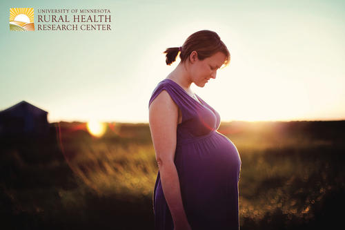 Image of pregnant woman in farm field.