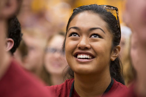 A young female student smiles