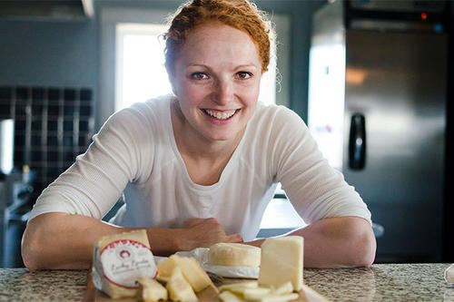 Alise Sjostrom and some of her farmstead cheeses