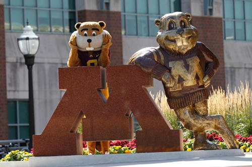 Goldy Gopher next to the Goldy statue outside of Coffman Union.