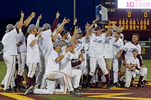 Gopher baseball players celebrate at Siebert Field, complete with their Big Ten championship trophy.