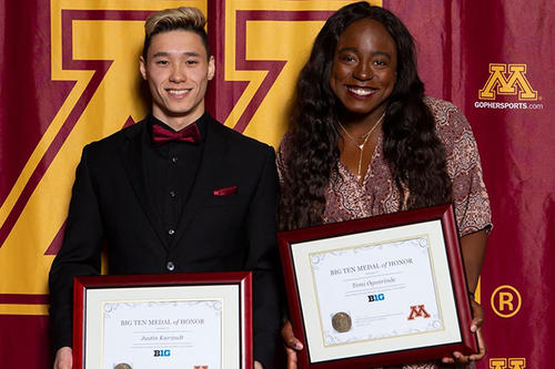 Justin Karstadt and Temi Ogunrinde pose with their awards.