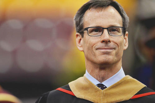 Portrait of Tom Staggs speaking at commencement. 