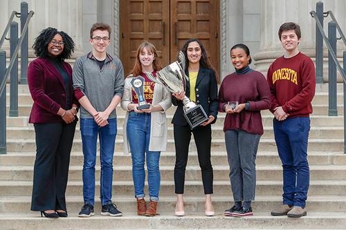 Student leaders pose with the trophies awarded to the University of Minnesota Twin Cities.