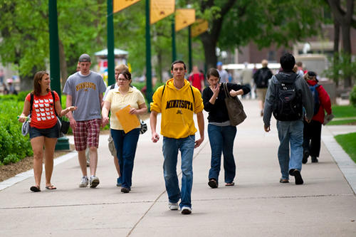 Students walk along Northrop Mall.