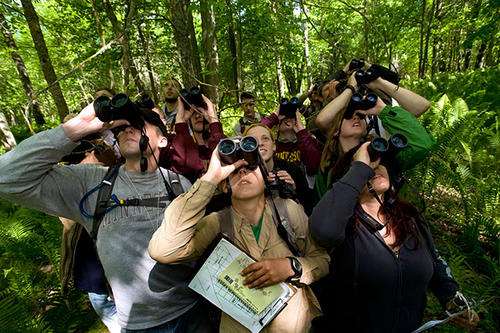 Students with binoculars