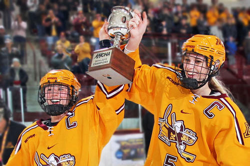 The two Gopher women&#039;s hockey captains hoist the WCHA championship trophy.