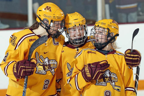 Three Gopher players, including Lee Stecklein and Amanda Kessel, celebrate during their win over Princeton.