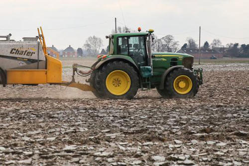 tractor spraying fields