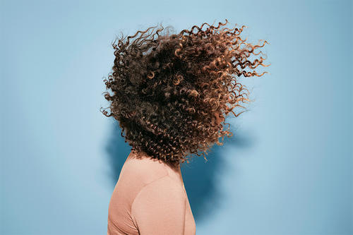 a woman's hair in wind