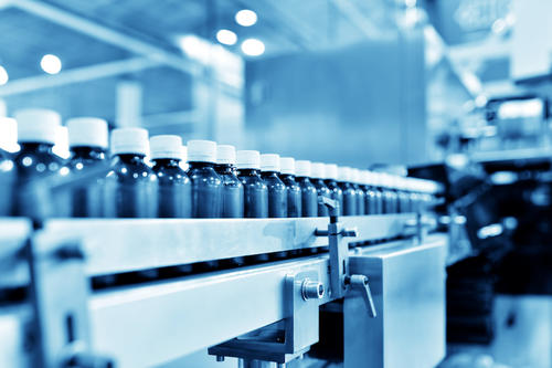 Medicine bottles on conveyor belt