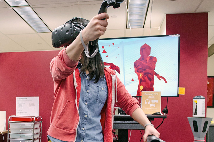 a student wearing virtual reality goggles